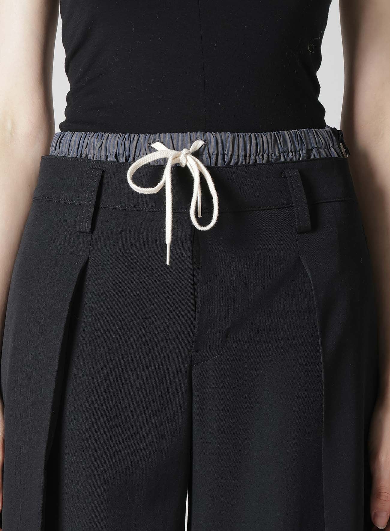 GABARDINE LAYERED-LIKE WIDE PANTS