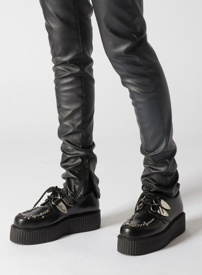 LEATHER + DENIM SLIM PANTS