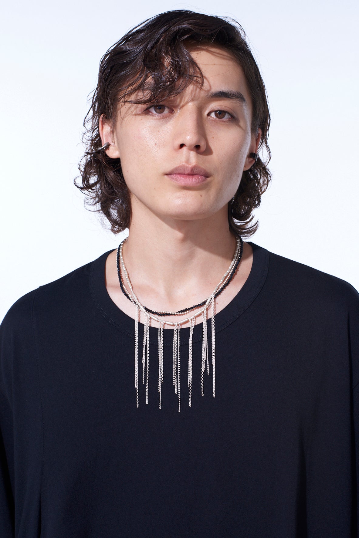 ONYX AND BRASS TASSEL LAYERED NECKLACE