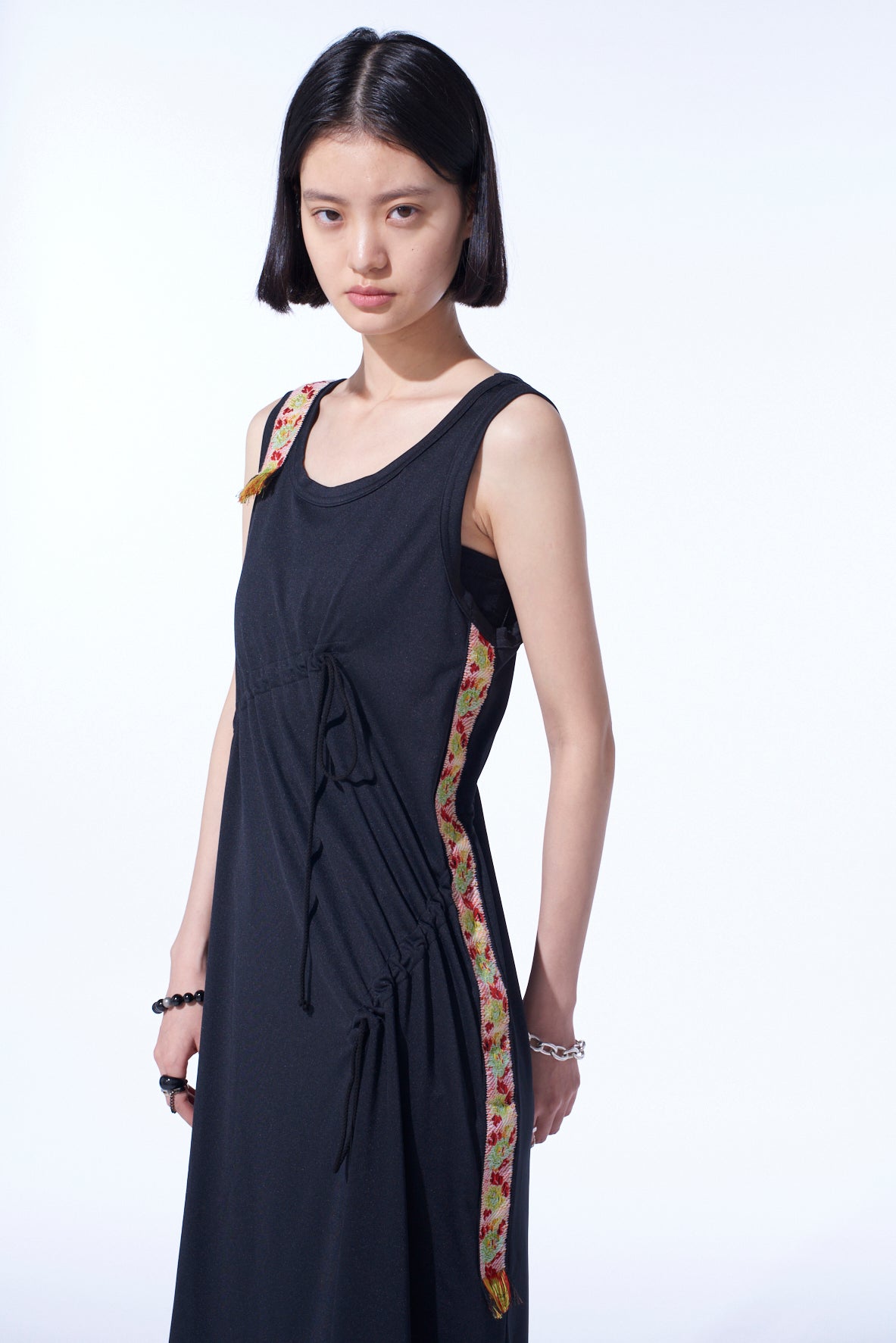 PE/SMOOTH JERSEY STRINGS GATHERED DRESS WITH TYROLEAN TAPES