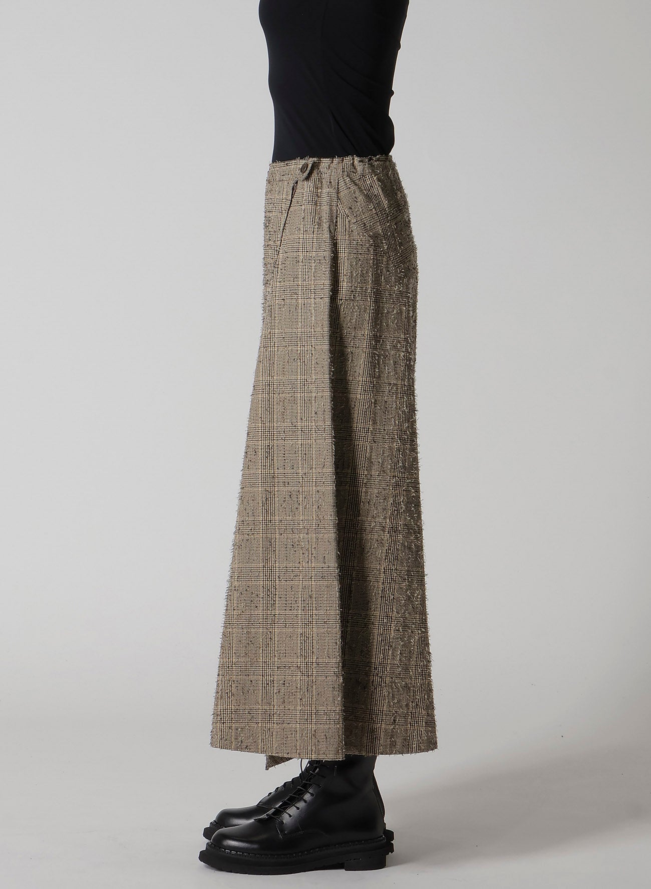 NEEDLE-PUNCHED ASYMMETRIC FLARE PANTS