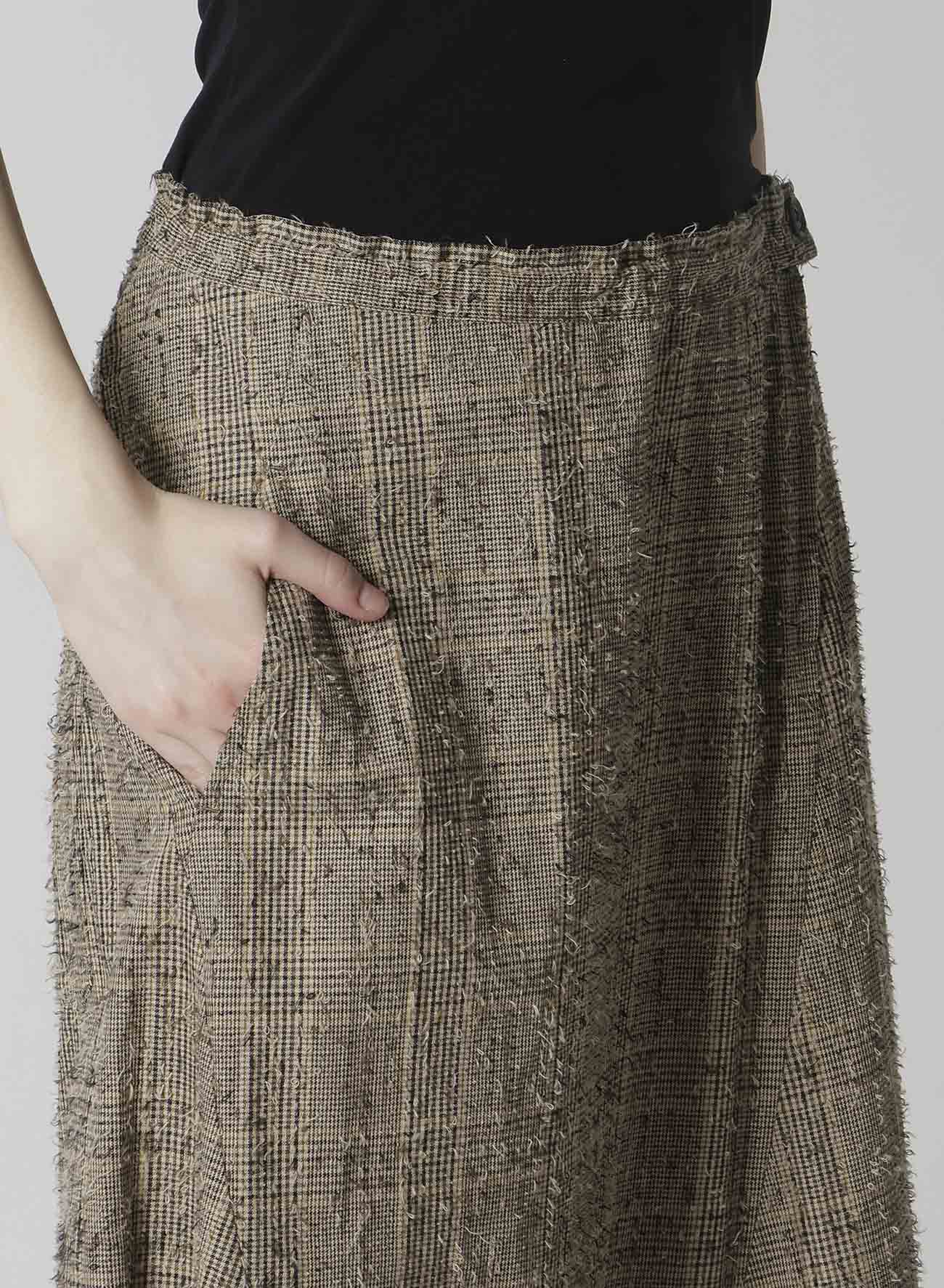NEEDLE-PUNCHED ASYMMETRIC FLARE PANTS