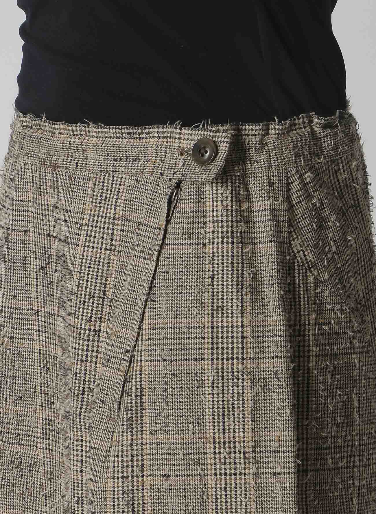 NEEDLE-PUNCHED ASYMMETRIC FLARE PANTS