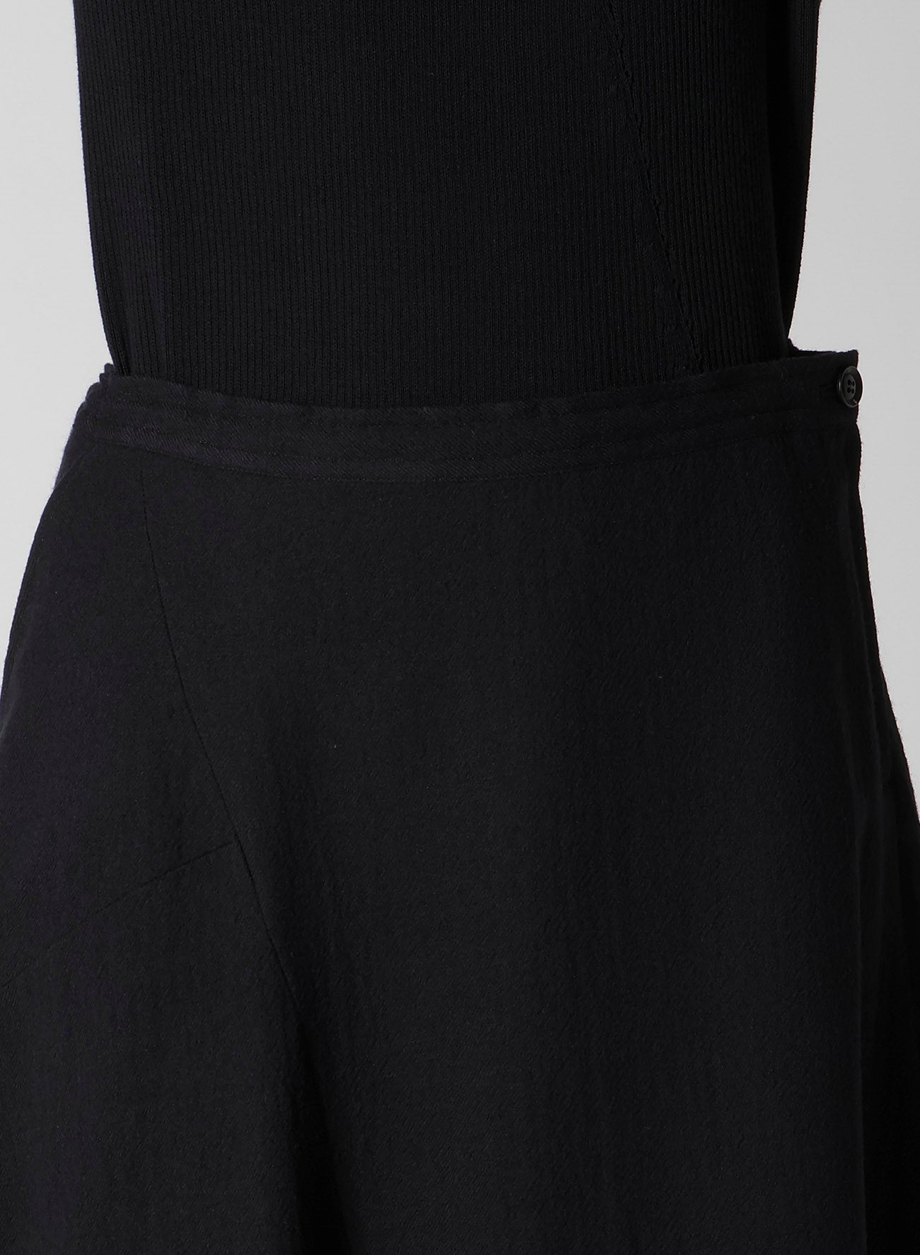 WOOL GAUZE TWILL ASYMMETRIC FLARE SKIRT
