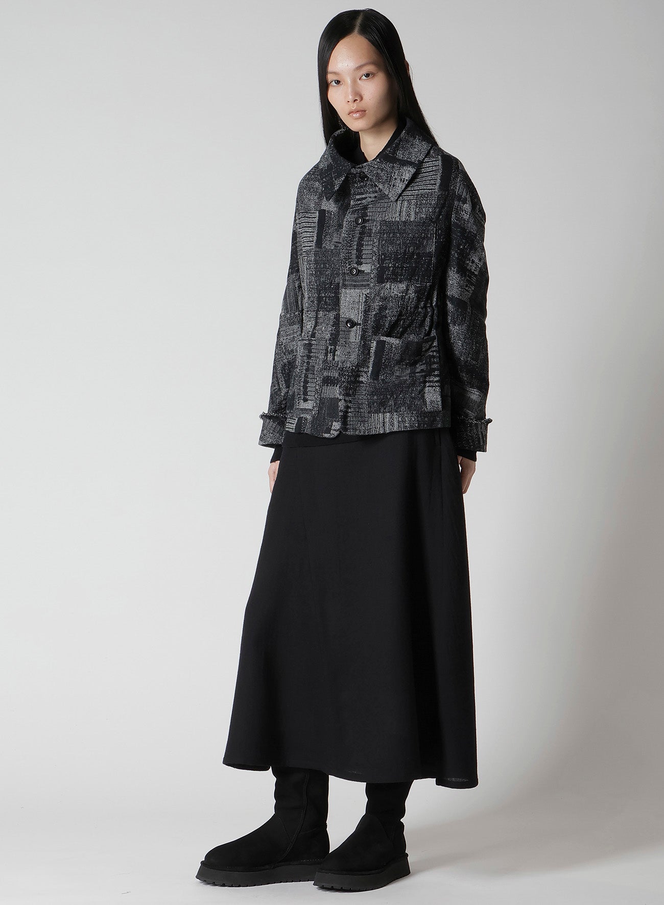 WOOL GAUZE TWILL ASYMMETRIC FLARE SKIRT
