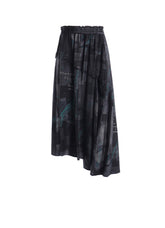 CUPRO DUNGAREE TWILL NEWSPAPER PRINT ASYMMETRIC SKIRT