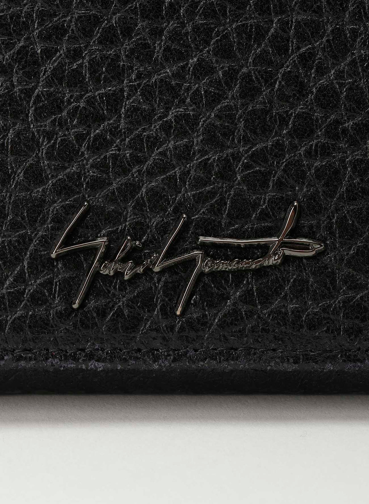 Clasp trifold wallet