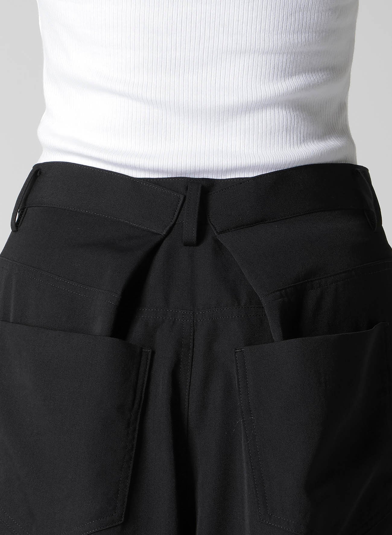 GABARDINE ASYMMETRY BAGGY PANTS