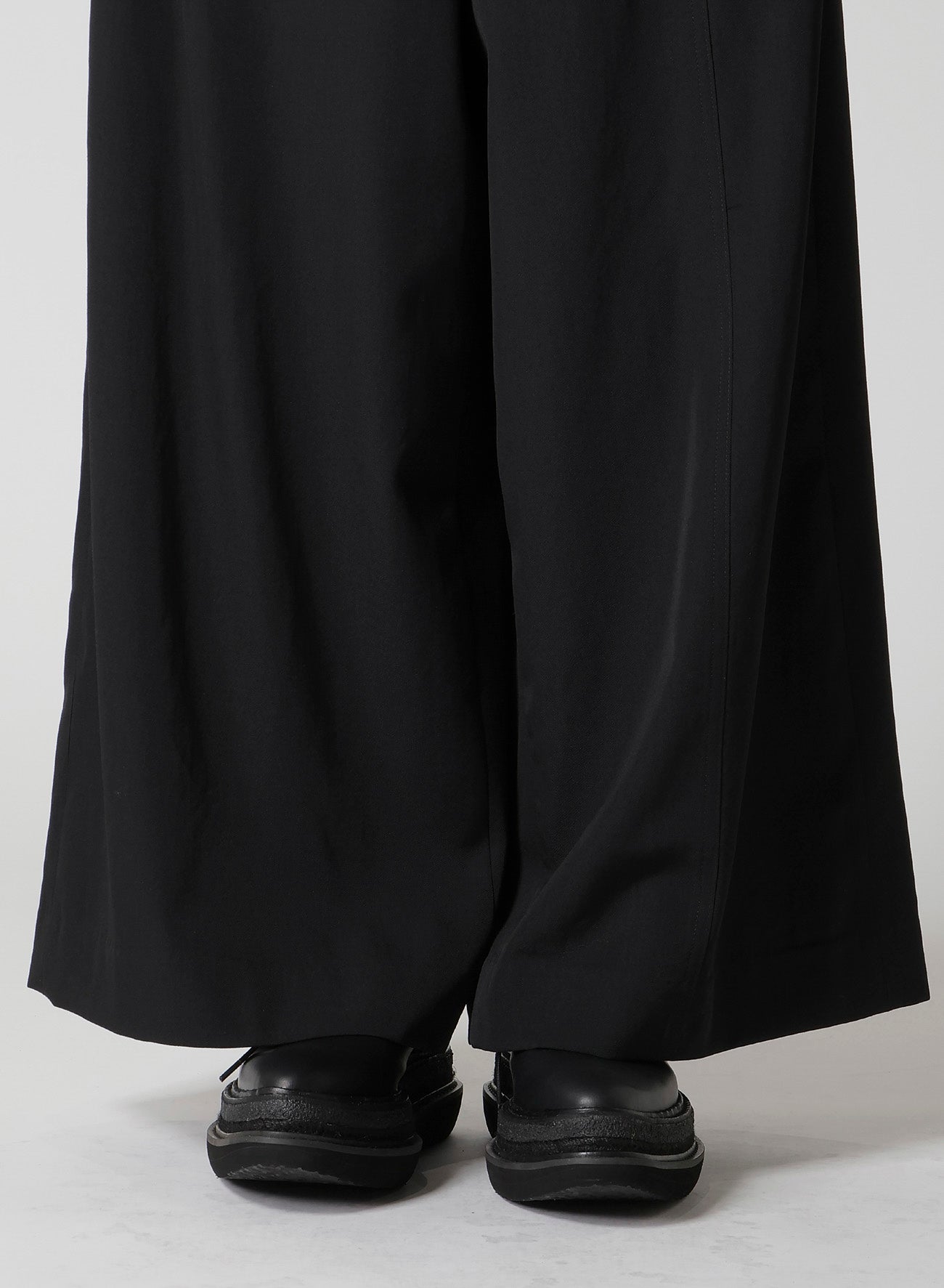 GABARDINE ASYMMETRY BAGGY PANTS