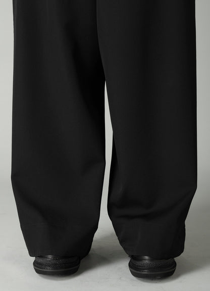 GABARDINE BACKSIDE TUCK BAGGY PANTS
