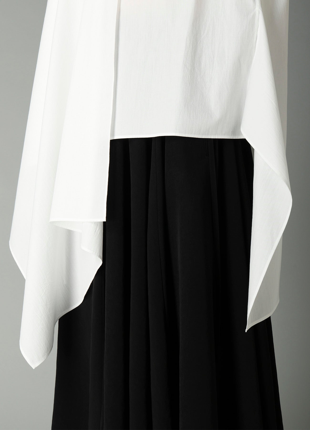 BROAD R LONG ASYMMETRIC BLOUSE