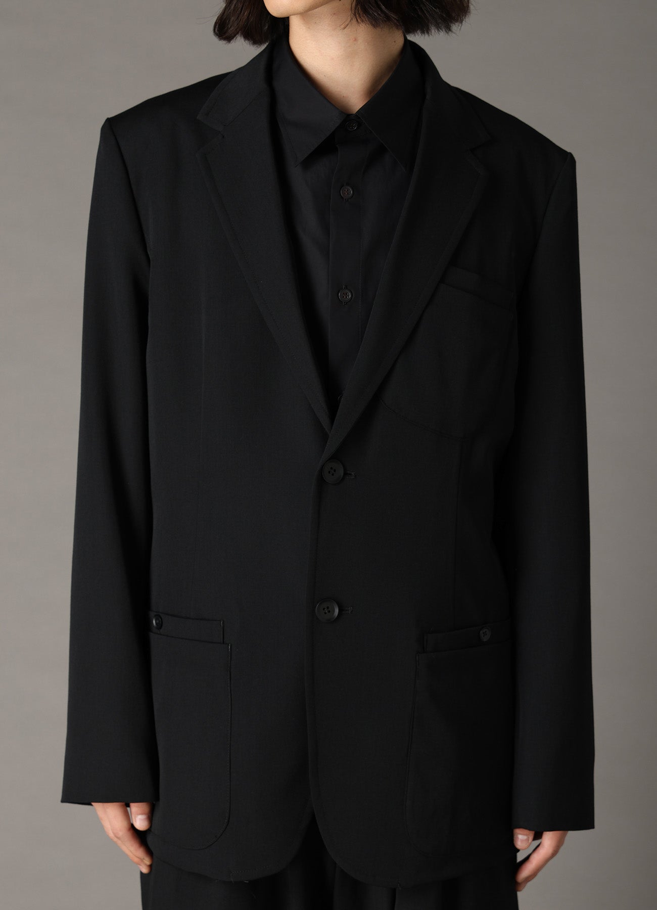 WOOL GABARDINE JACKET WITH EYELETS AND BACK BELT