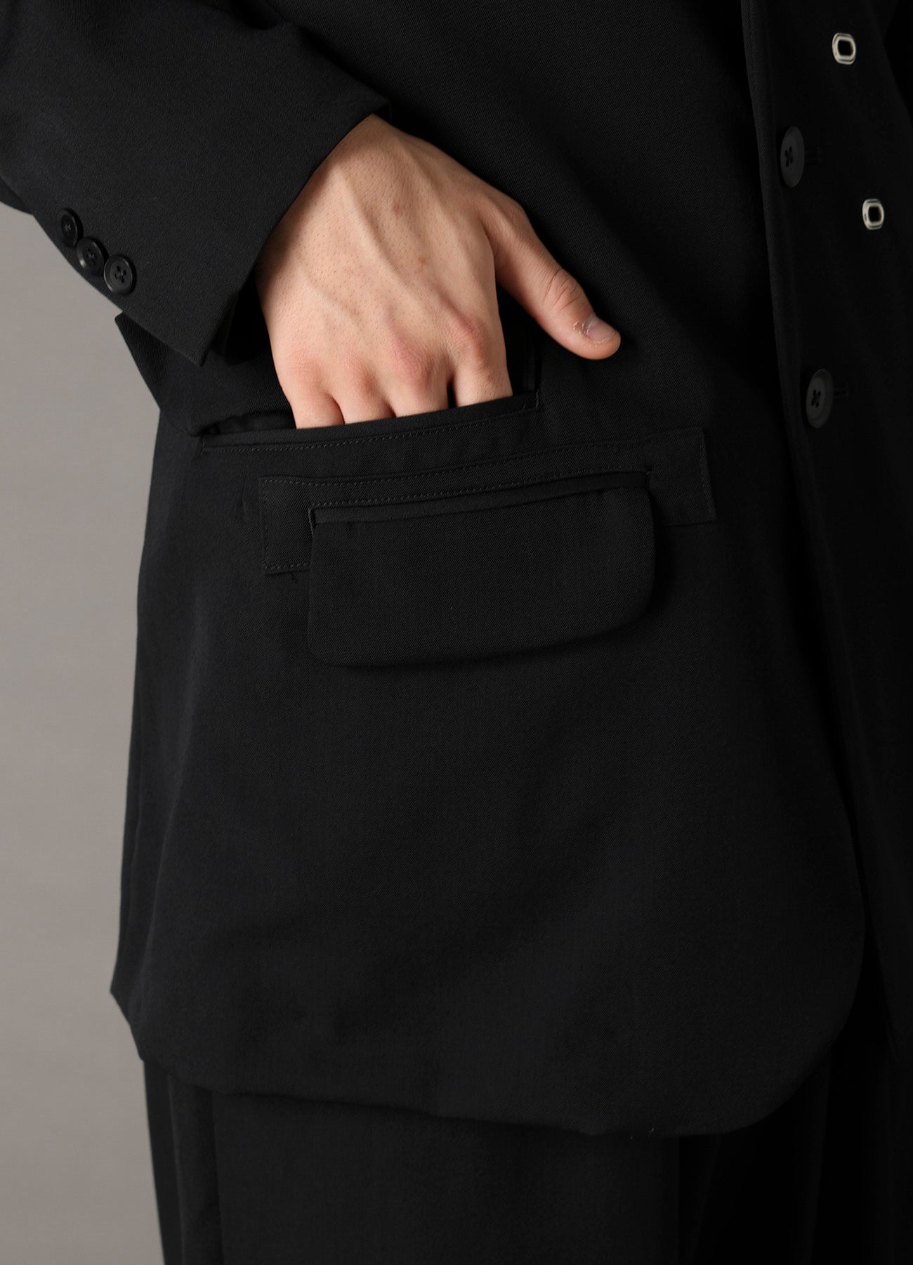 WOOL GABARDINE JACKET WITH EYELETS