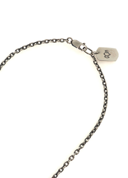 SILVER950 YY OVAL SCULL DAGGER PENDANT