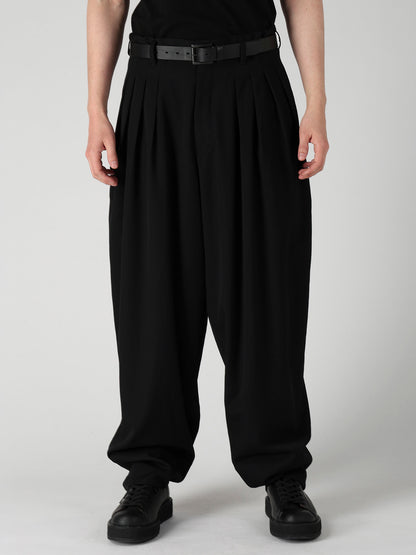 WOOL GABARDINE 16 TUCKS STACKED HEM PANTS