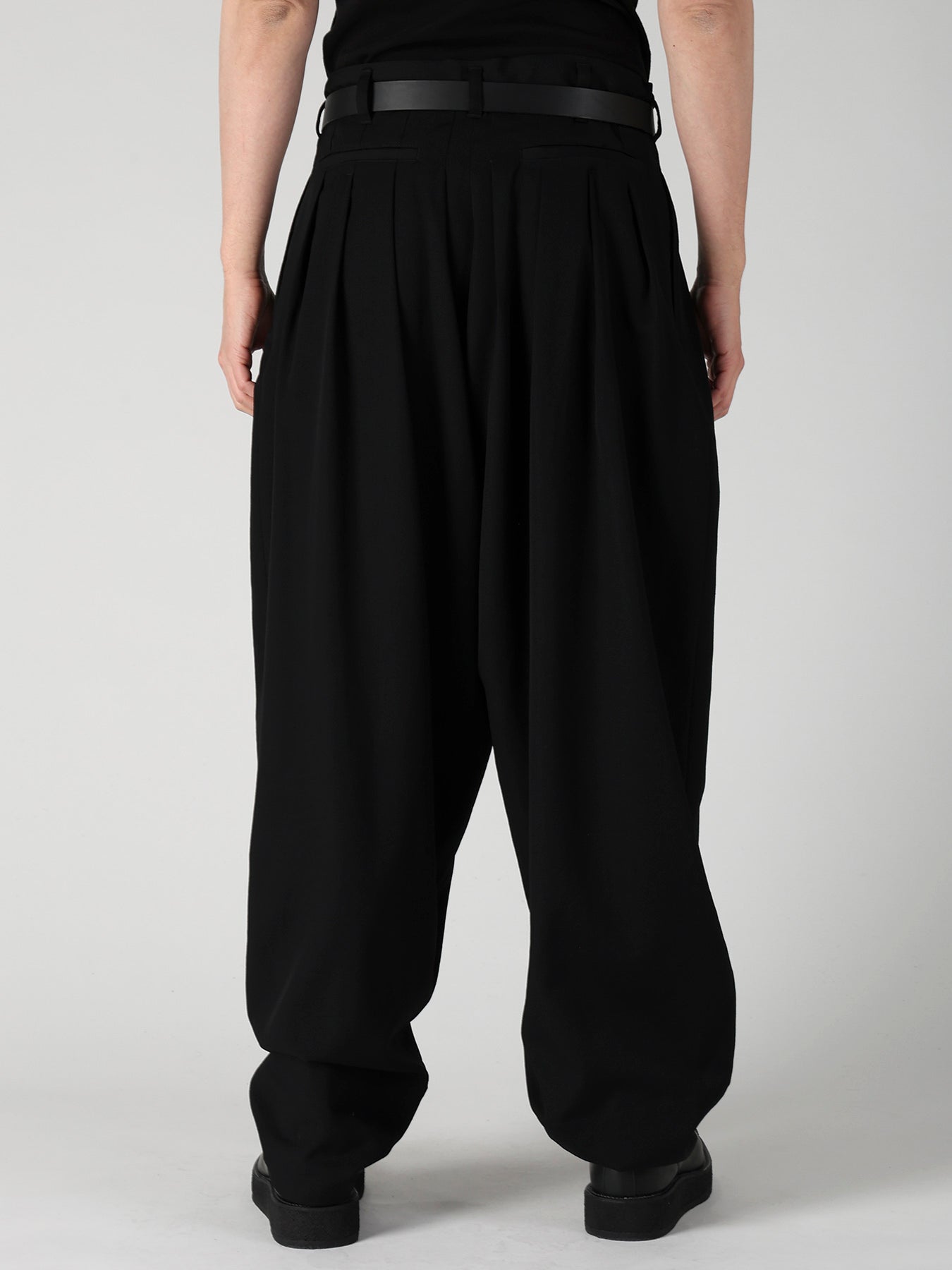 WOOL GABARDINE 16 TUCKS STACKED HEM PANTS
