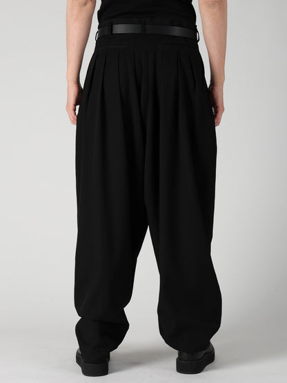 WOOL GABARDINE 16 TUCKS STACKED HEM PANTS