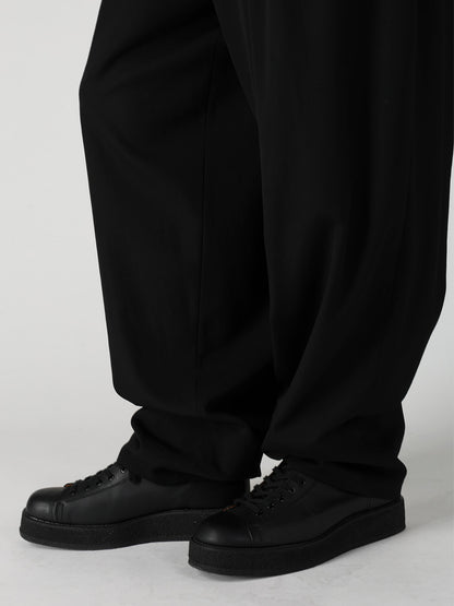 WOOL GABARDINE 16 TUCKS STACKED HEM PANTS
