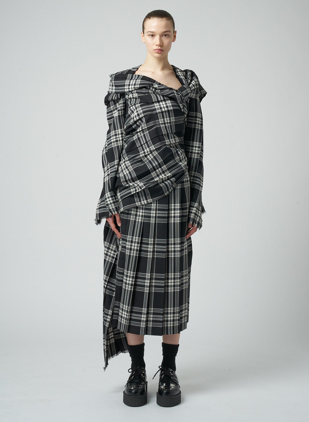 PLAID DRESS WITH TWISTED PLEATS