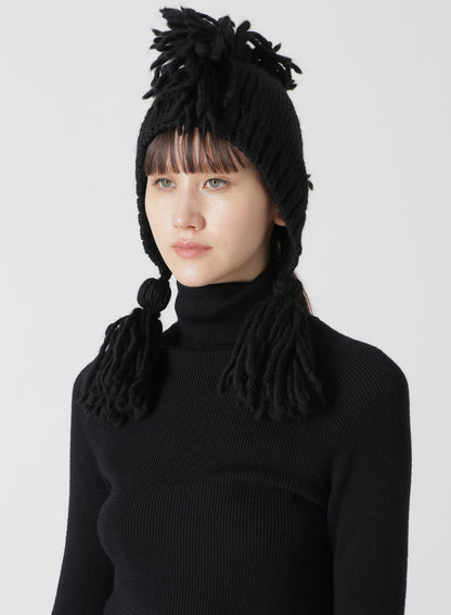 KNITTED WOOL JERSEY HAT WITH TASSELS AND SPIKES