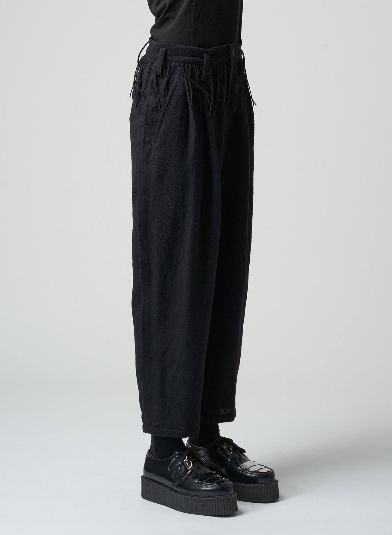 PLEATED SERGE PANTS WITH FRINGE DETAILS