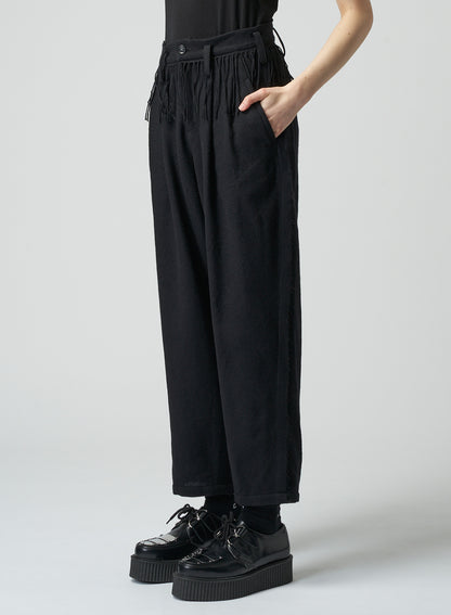 PLEATED SERGE PANTS WITH FRINGE DETAILS