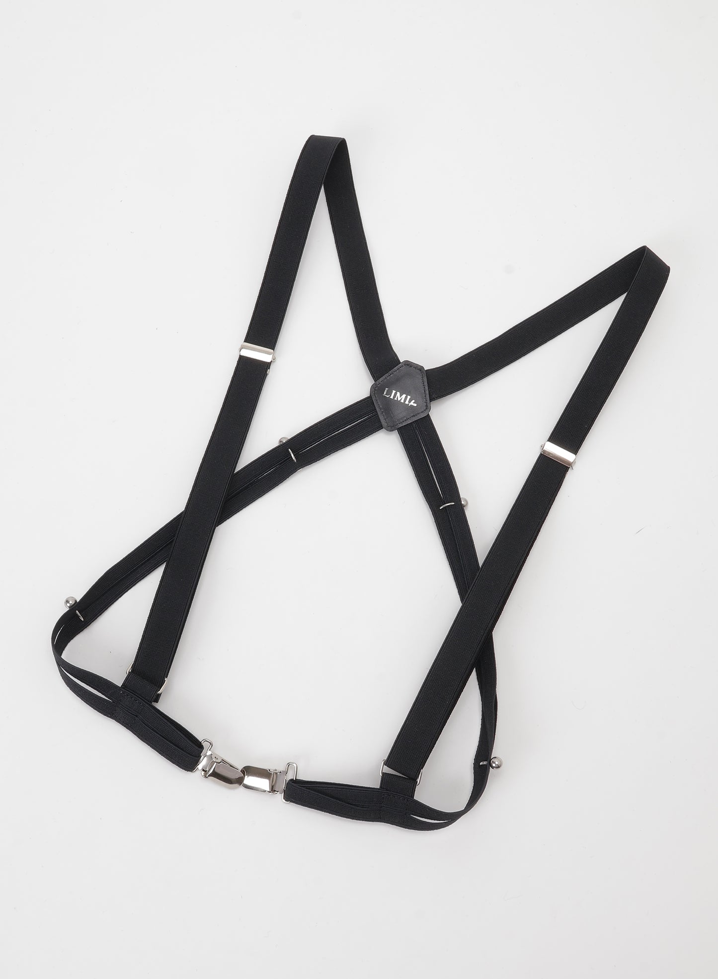 RUBBER SUSPENDER BELT WITH PIERCED ACCENTS