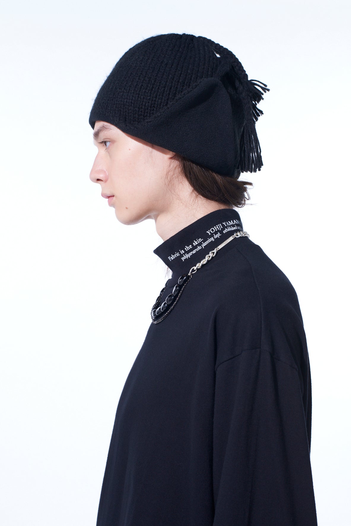 KNIT BEANIE WITH FRINGED EARPIECES