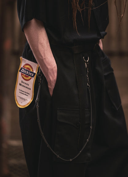 S'YTE × DICKIES-ASYMMETRIC FLAP-POCKET TAPERED PANTS