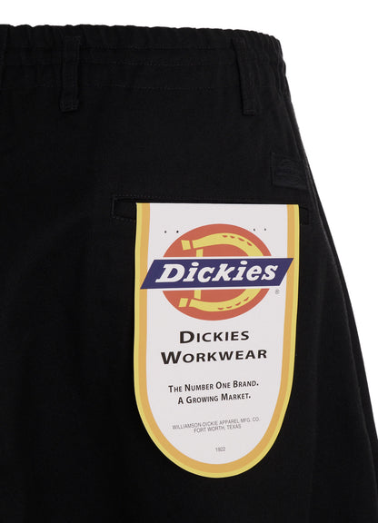 S'YTE × DICKIES-ASYMMETRIC FLAP-POCKET TAPERED PANTS
