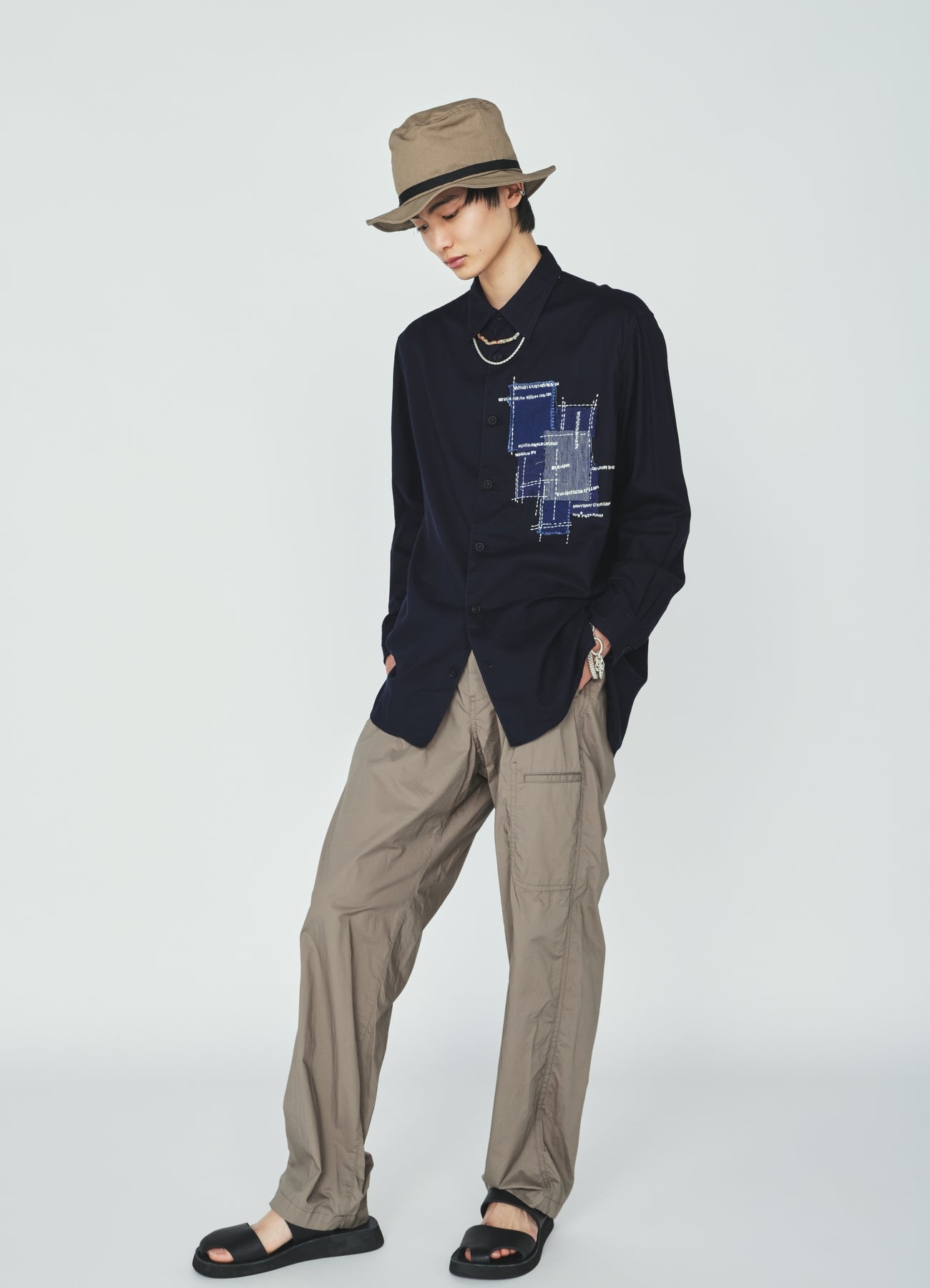 COTTON TYPEWRITER SIDE-POCKET TAPERED PANTS