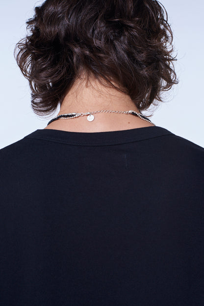 ONYX AND BRASS TASSEL LAYERED NECKLACE
