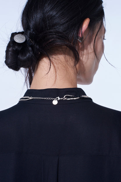 ONYX AND BRASS TASSEL LAYERED NECKLACE