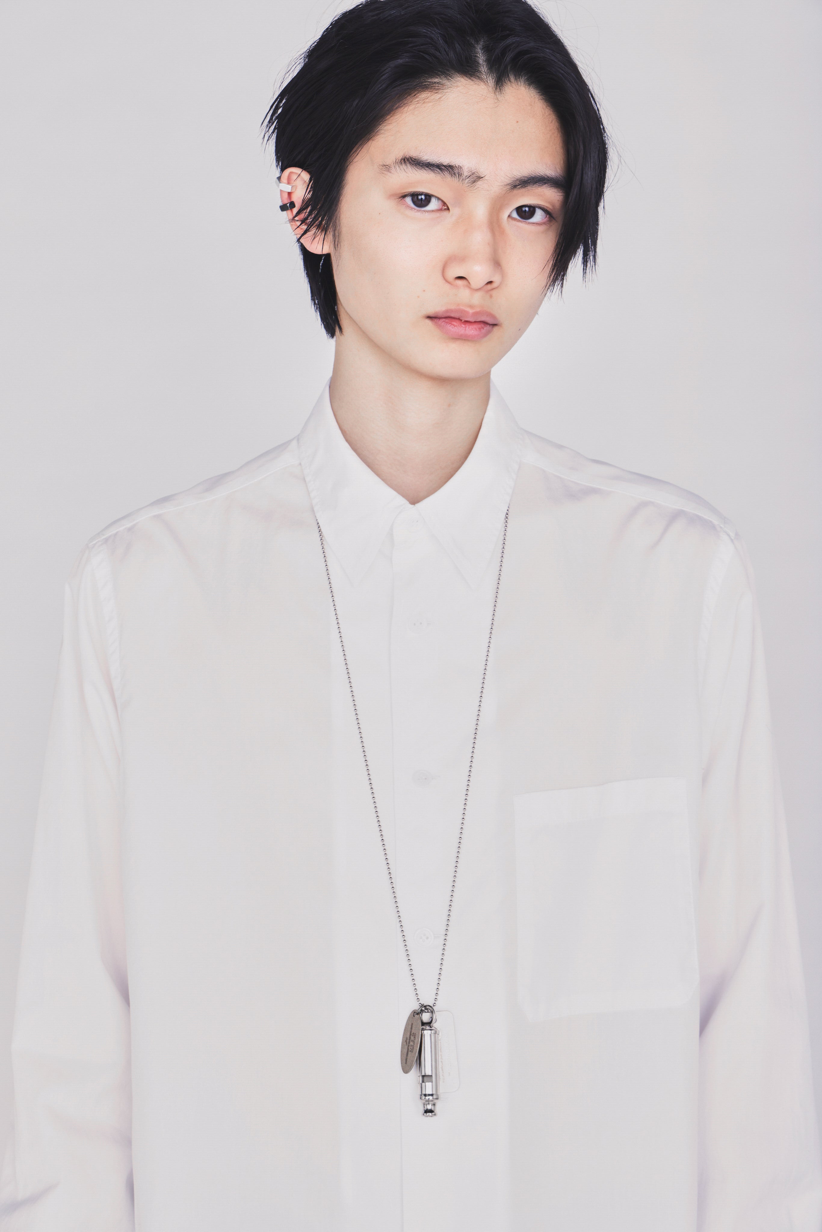 STAINLESS STEEL WHISTLE NECKLACE WITH BRASS TAG – THE SHOP YOHJI