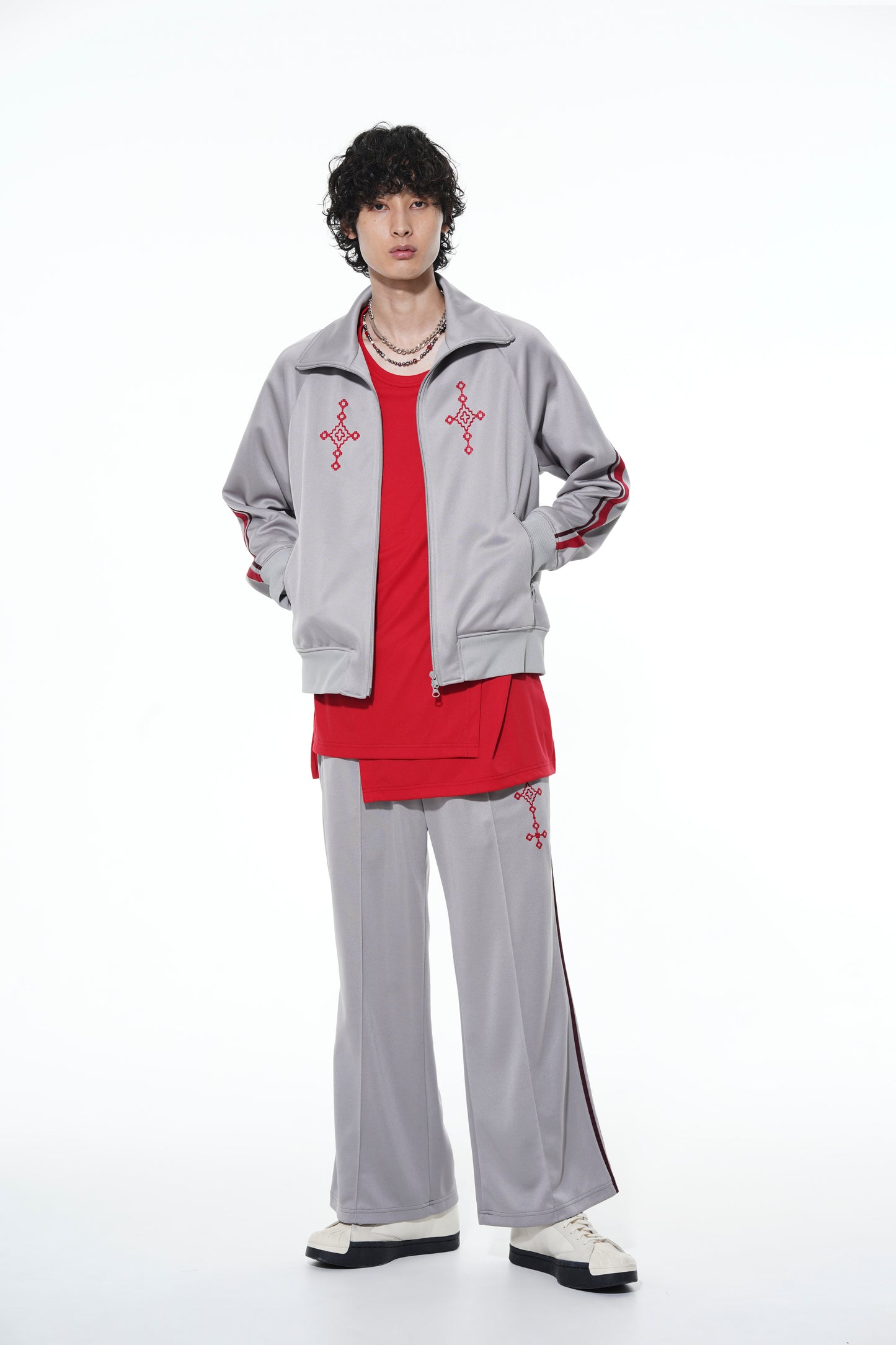 PE/SMOOTH JERSEY GEOMETRIC PATTERN EMBROIDERY SIDE TAPE LINE FLARE PANTS