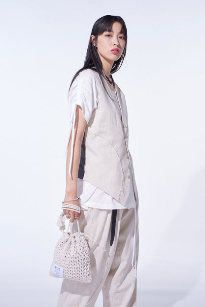 KNITTED DRAWSTRING MINI BAG