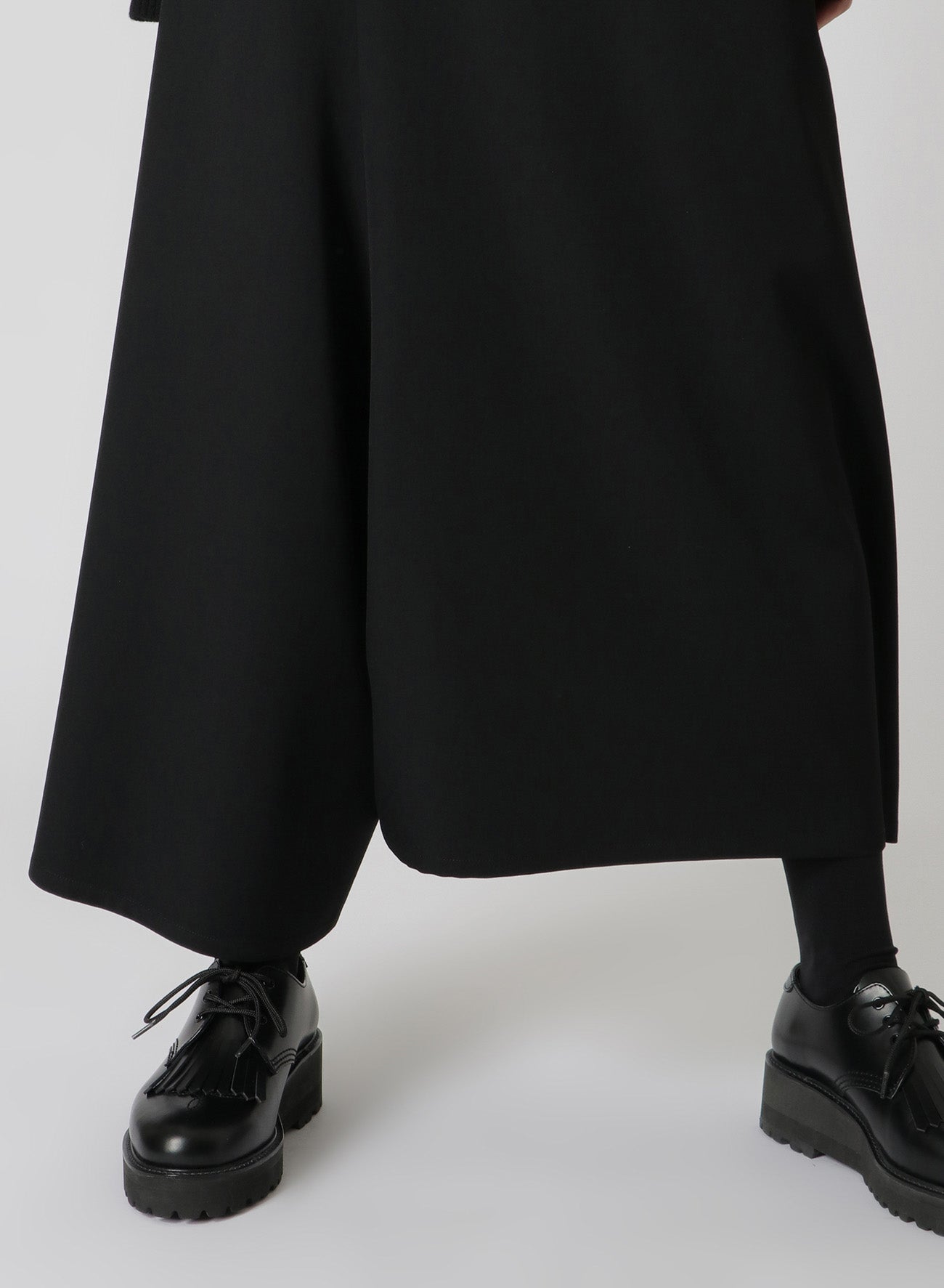 WOOL GABARDINE ASYMMETRIC FLARED PANTS