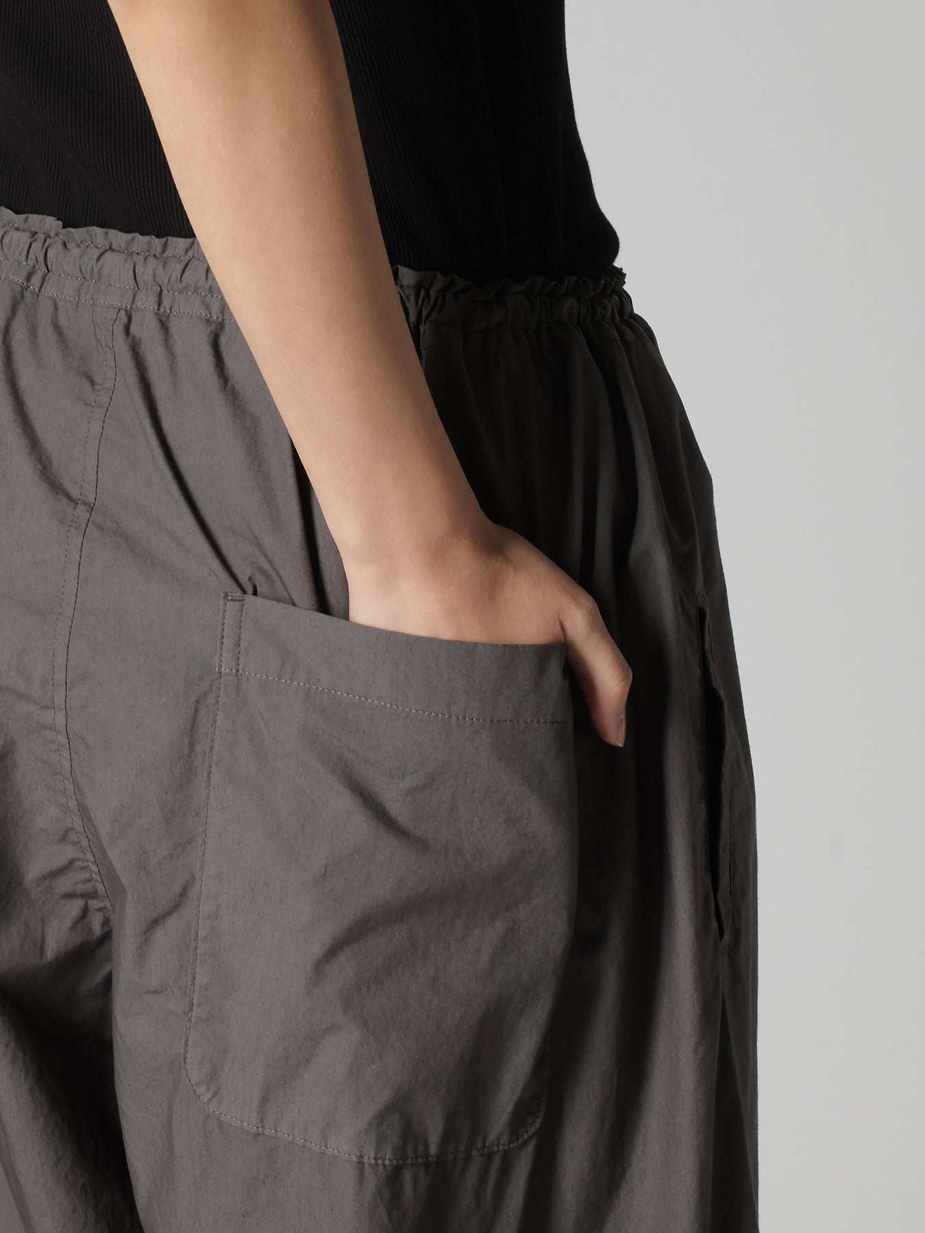 COTTON TYPEWRITER LEFT DRAPE PANTS