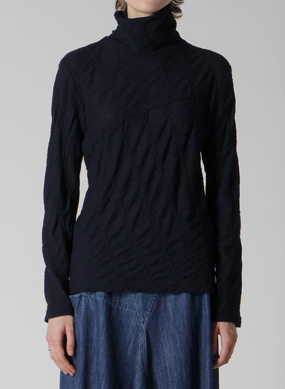 TUCKED DIAGONAL CABLE JQ HIGH NECK LONG T