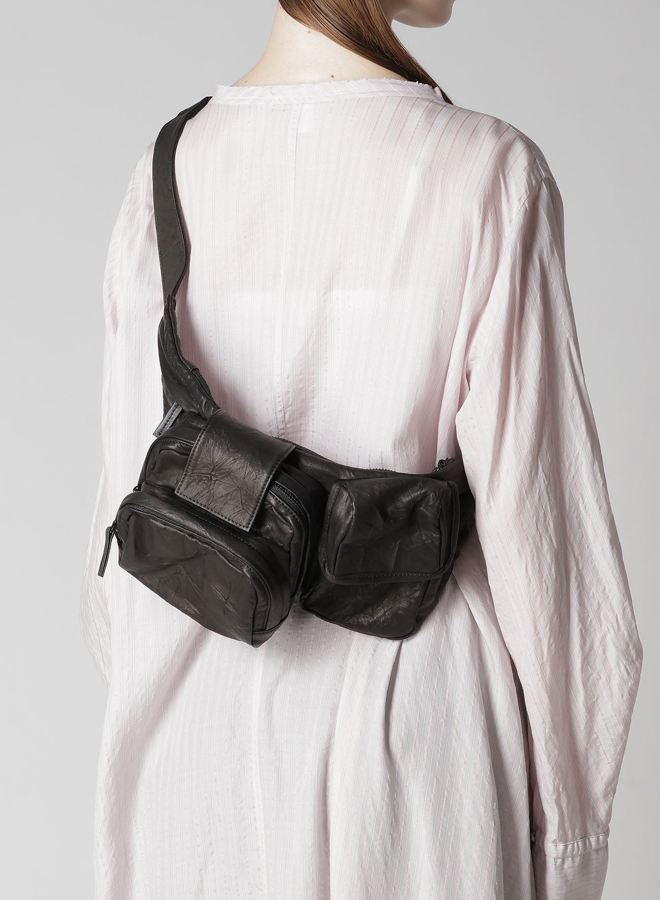 TWISTED SOFT LEATHER POCKET BAG