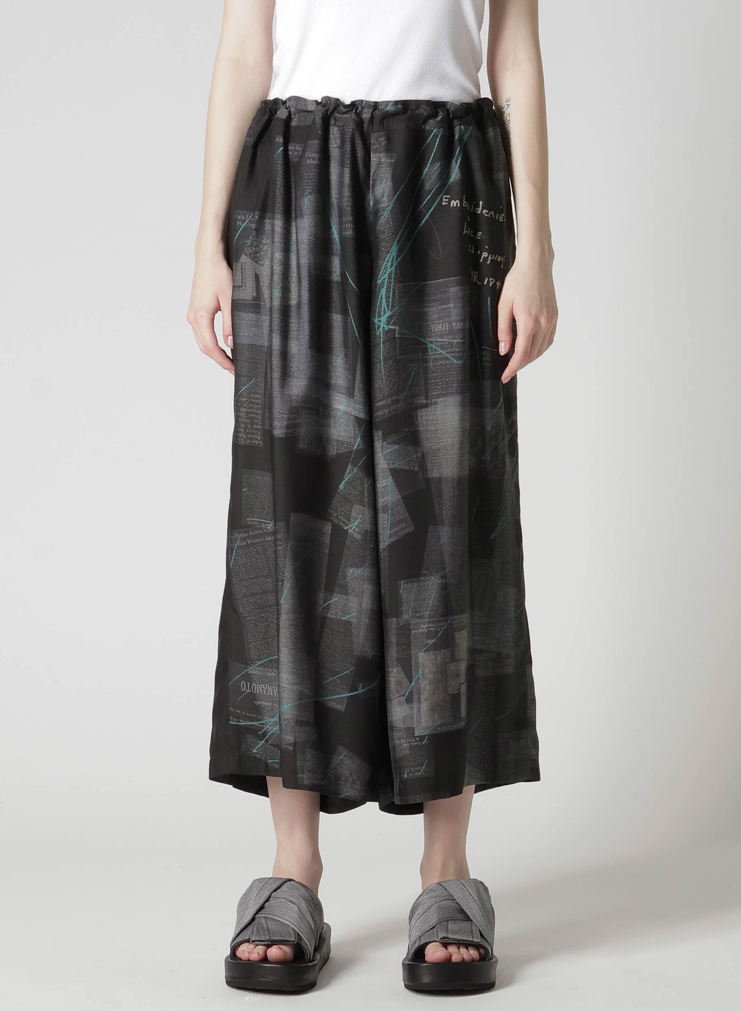 CUPRO DUNGAREE TWILL NEWSPAPER PRINT PANTS