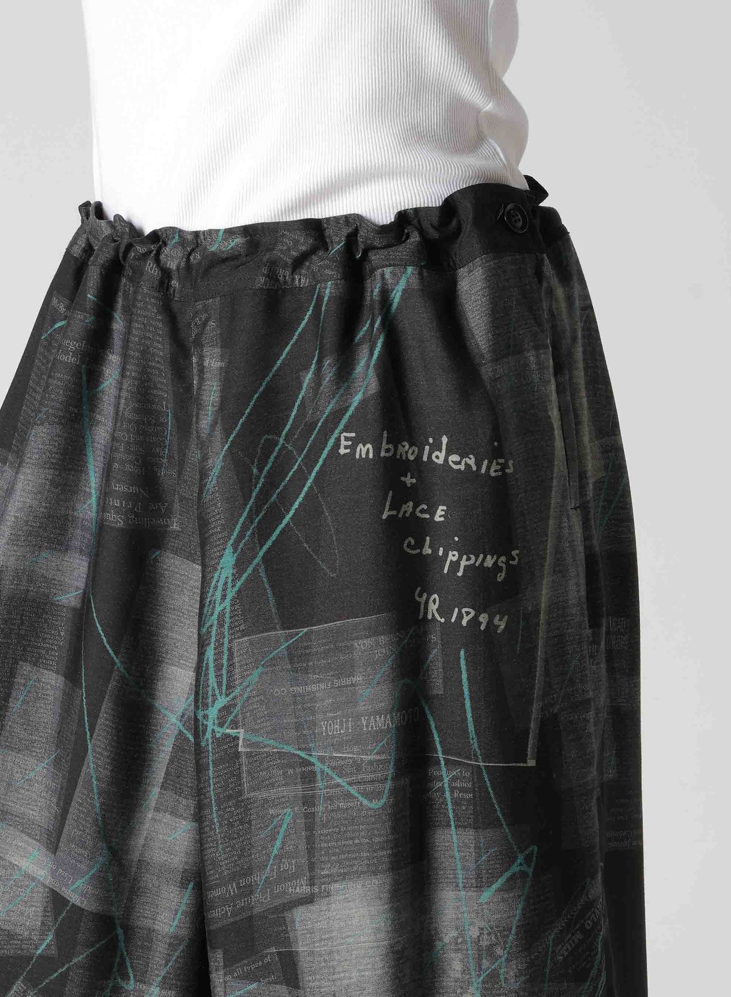 CUPRO DUNGAREE TWILL NEWSPAPER PRINT PANTS