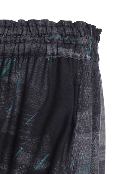 CUPRO DUNGAREE TWILL NEWSPAPER PRINT ASYMMETRIC SKIRT