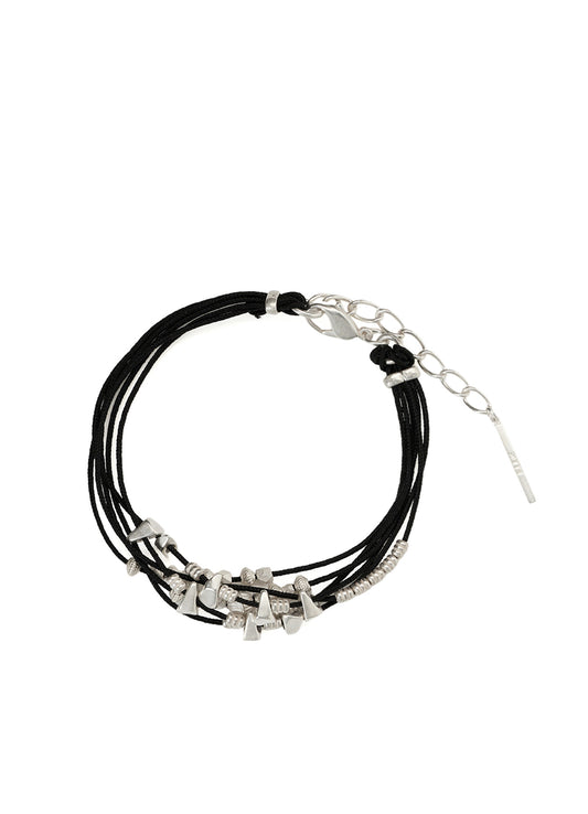 BRAIDED LEATHER BRACELET WITH BRASS CONES