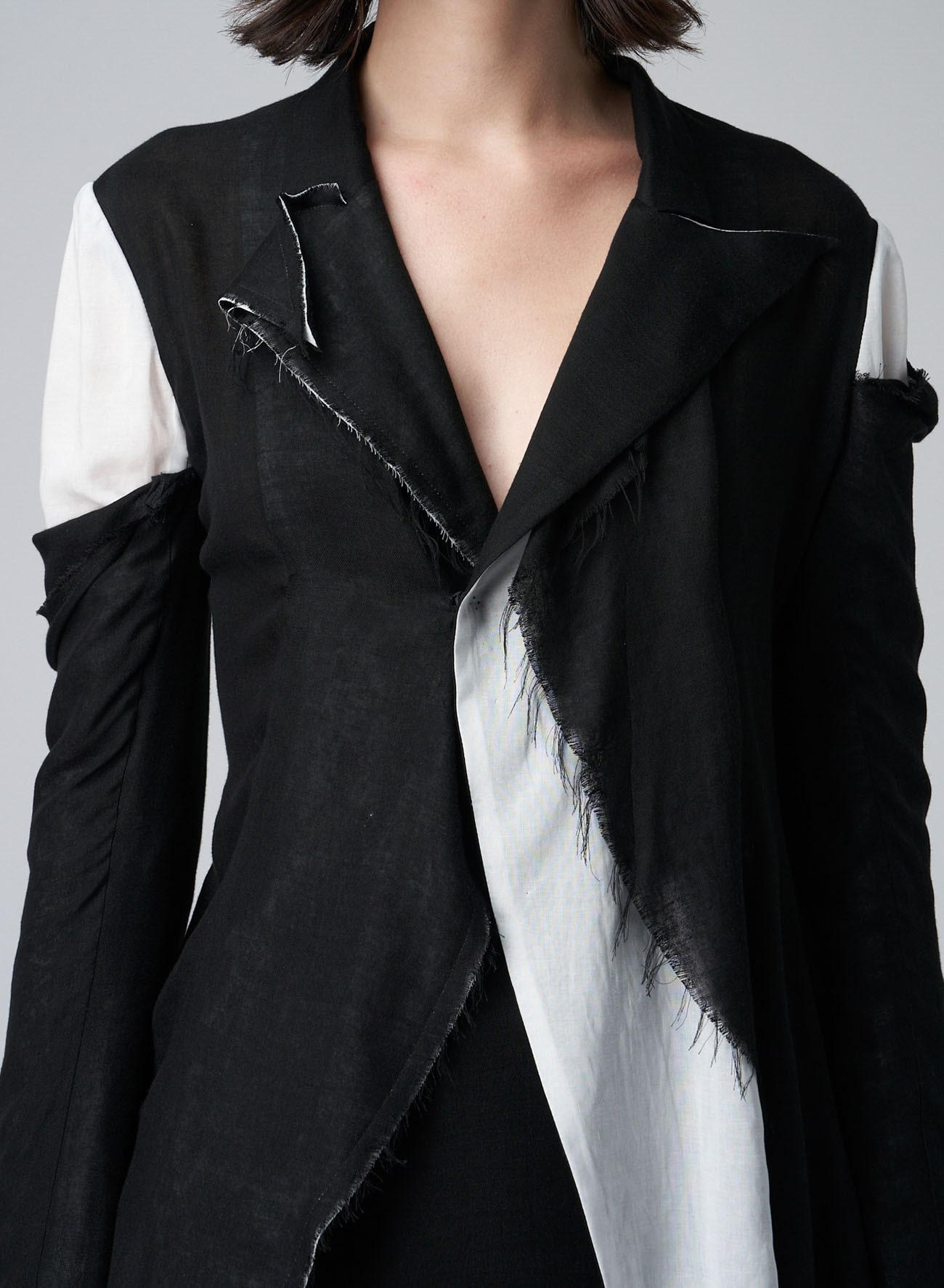 JACKET WITH DOUBLE-LAYERED LEFT SIDE	