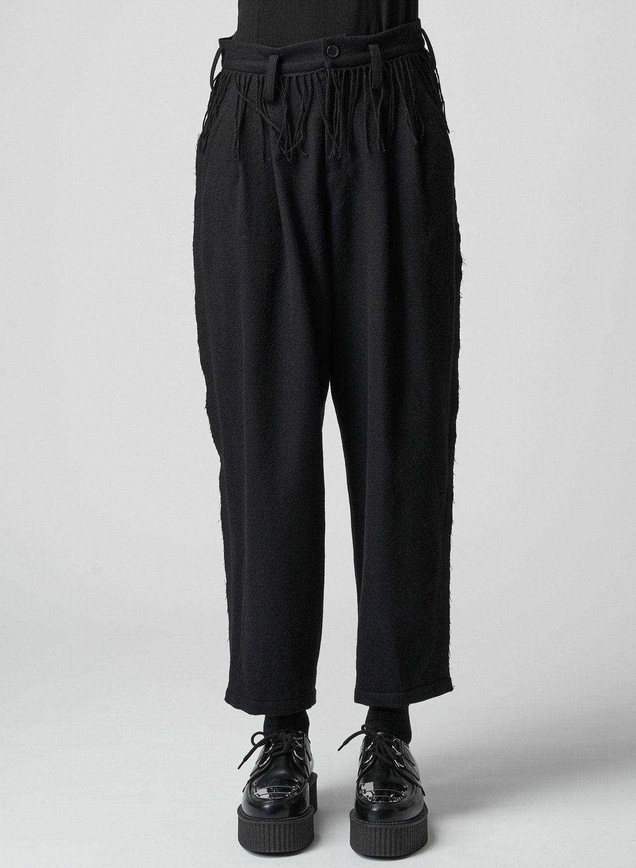 PLEATED SERGE PANTS WITH FRINGE DETAILS