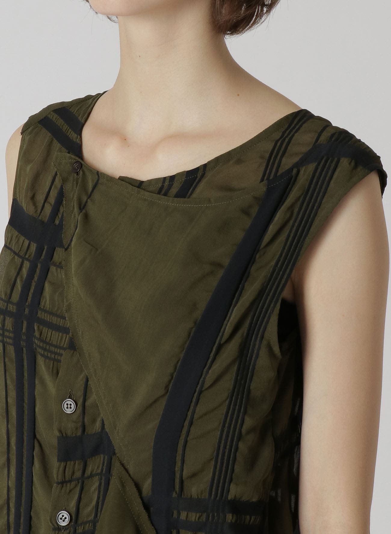 SLEEVELESS TOP WITH FLAP PANEL