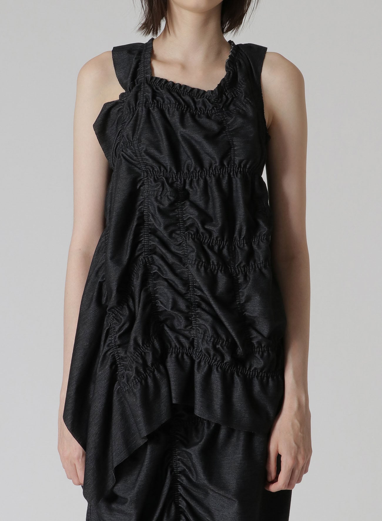 SLEEVELESS TOP WITH SHIRRING DETAILS AND RIGHT DRAPE